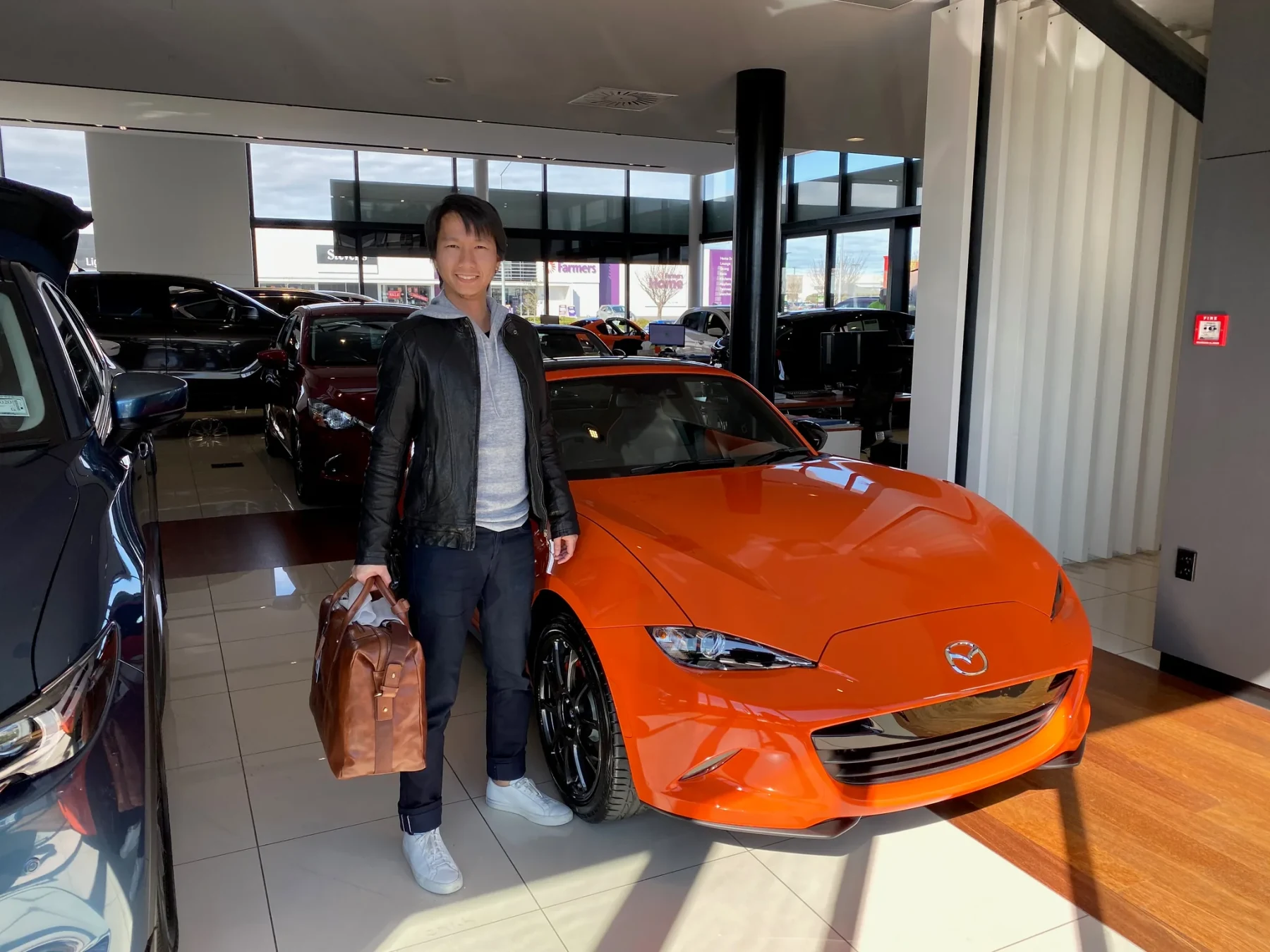 Taking delivery of my Mazda MX-5 30th Anniversary Edition.